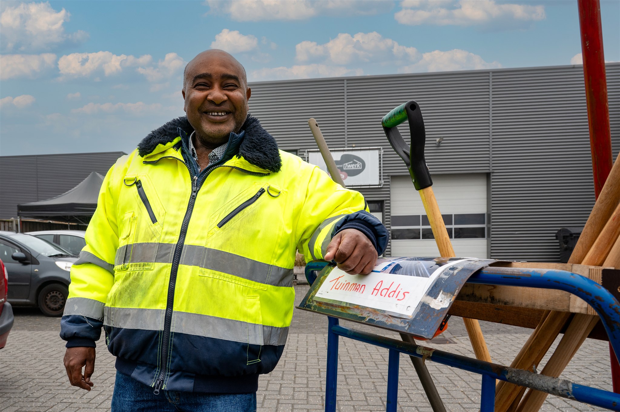 Close portrait showing person with work materials